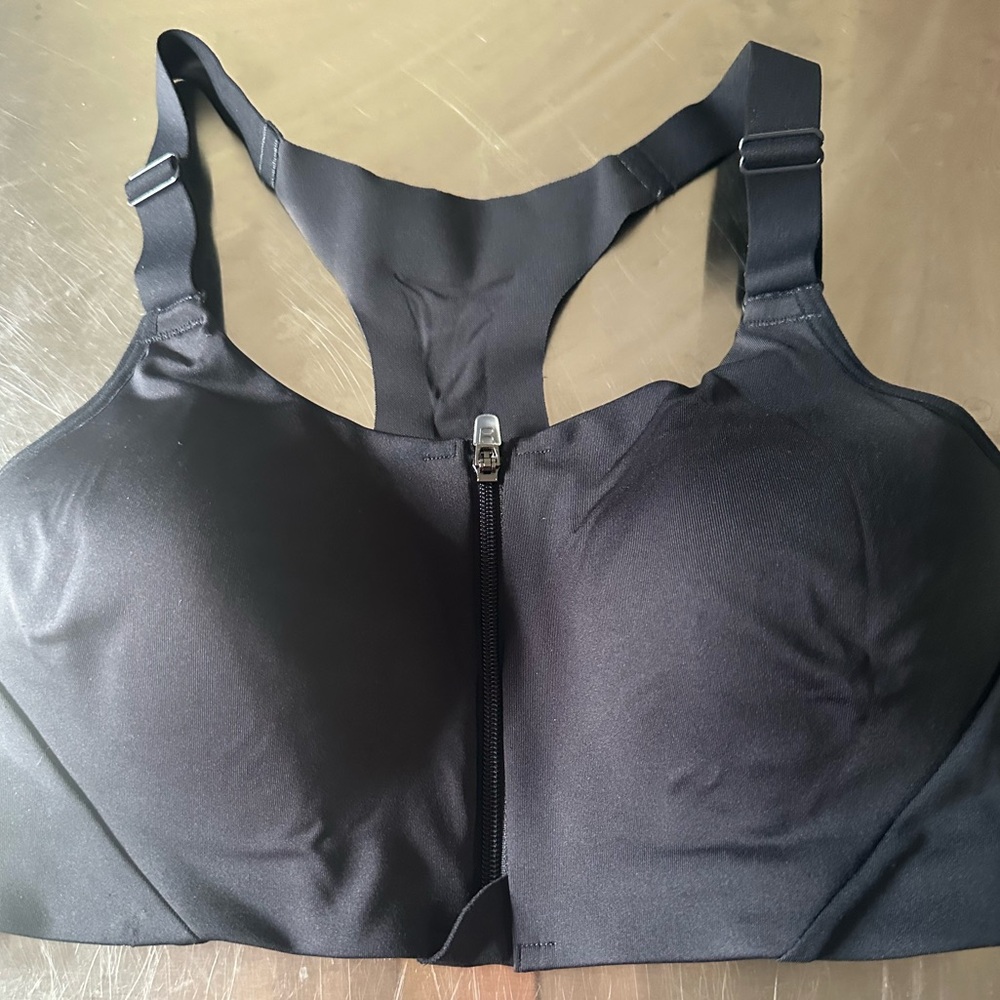 All in motion zip up black sports bra with adjustable straps size 34C NWT